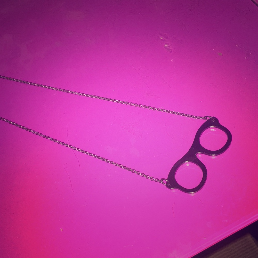All black glasses Justice necklace